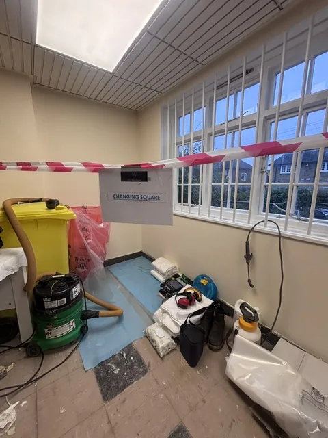 Asbestos floor tile and bitumen removal in Manor Park